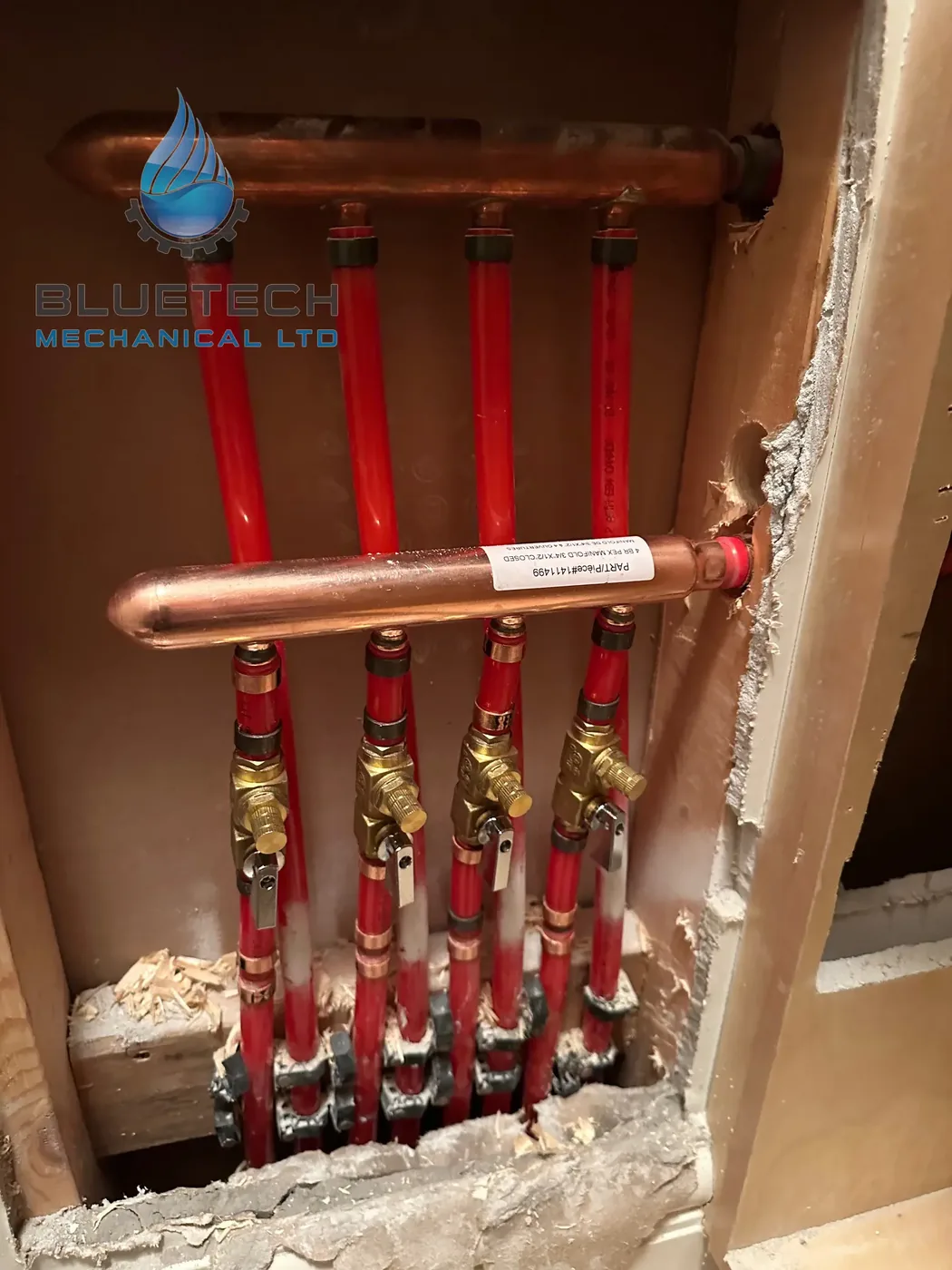 Copper and PEX water manifold with shutoff valves